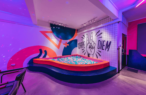 Vibrant Venue With Glasshouse Cafe and Interactive Art