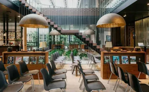 Open-Plan Restaurant With Floating Staircase