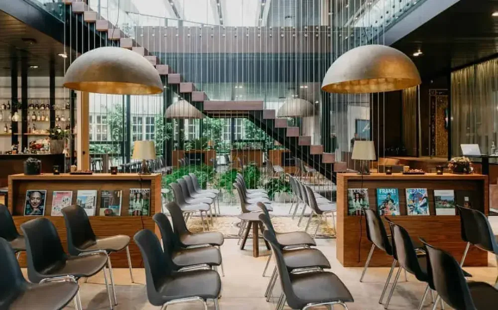 Open-Plan Restaurant With Floating Staircase
