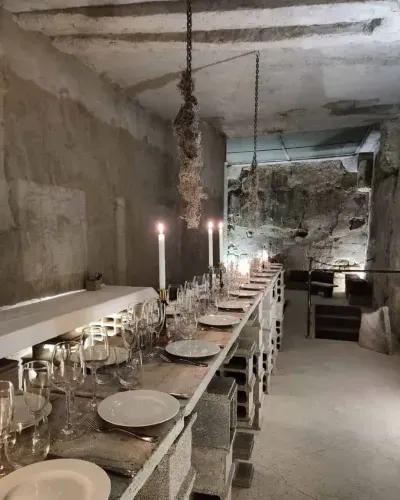 Avant-Garde Brutalist Venue With a Glass Skylight