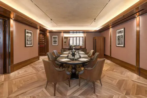 Walnut-Panelled Boardroom With Chevron Parquet