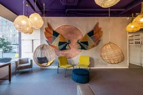 Quirky Vibrant Venue With Striking Geometric Wall Art