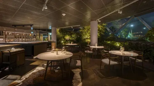 Modern Glass Dome Restaurant with Lush Greenery for Upscale Events