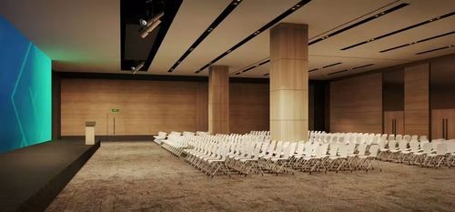 Sleek conference hall with full-width LED screen in Singapore