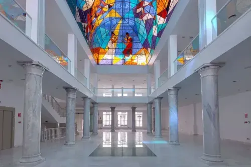 Marble atrium with stained glass dome in Madrid