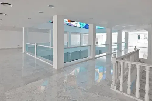 Elegant White Gallery With Marble Flooring