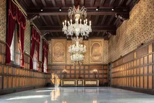 Ornate Silk Weaver's Hall With Intricate Wall Carvings for Prestigious Events