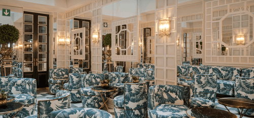 Victorian-Style Salon With Mirrored Walls