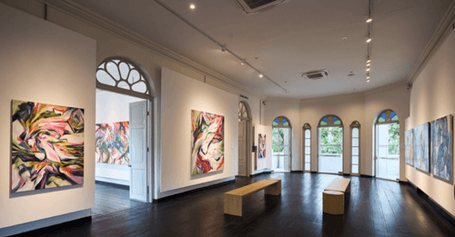 White Colonial-Era Hall With Artistic Flair