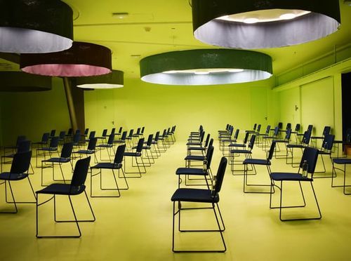 Futuristic Haven With Neon Green-Lit Accents for Immersive Conferences