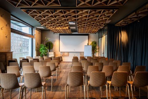 Waterview Space With Geometric Ceiling