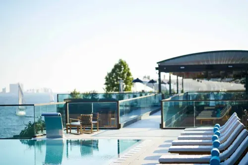 Magical Poolside Lounge With Astonishing River Views for Chic Networking Events
